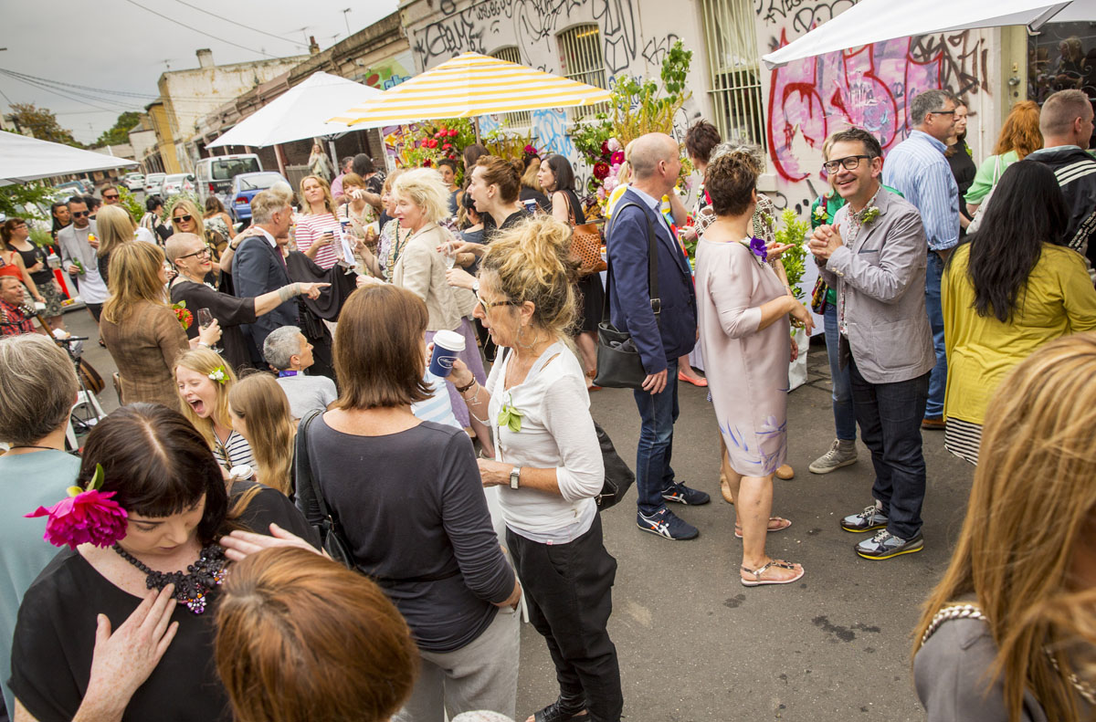 A group of people outdoor at a street party.
